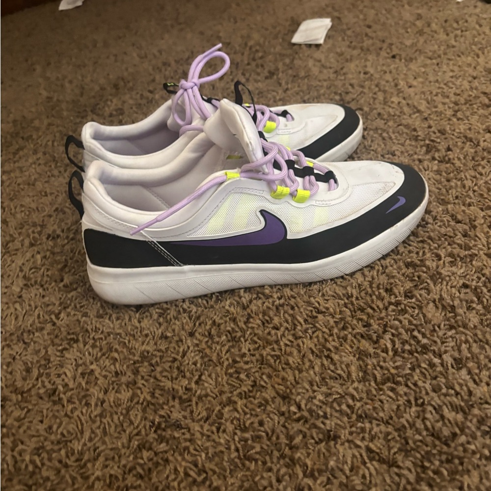 Nyjah Nike White Sneakers with Purple Swoosh and Black Trim